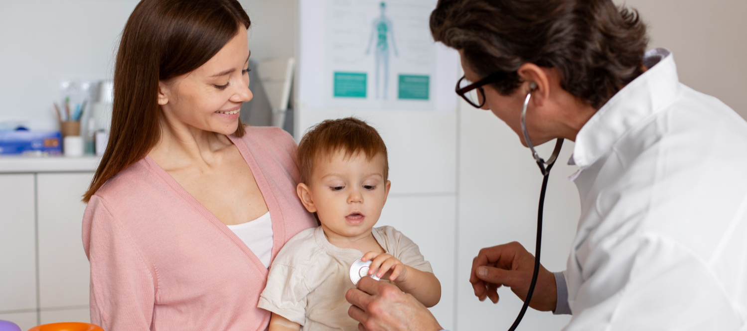Pediatrician examining a baby at Opal Hospital