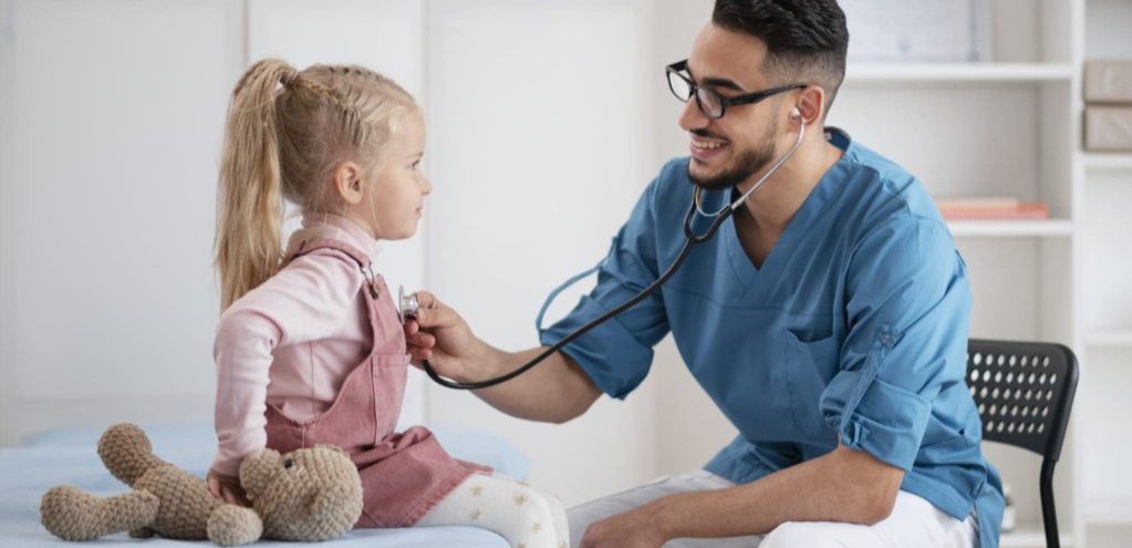 Pediatrician consulting with a child at Opal Hospital